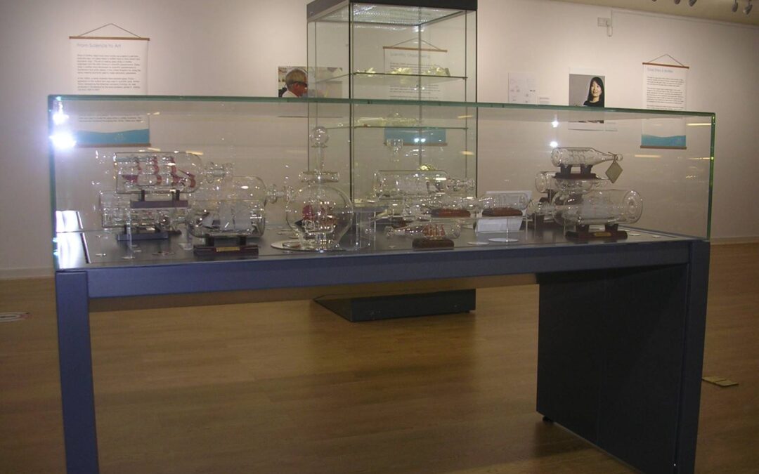 Glassblowers in a museum, glass ships in  bottles!